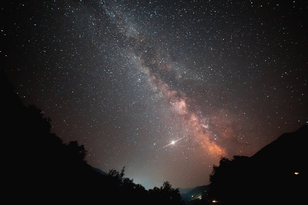 Breathtaking night sky photo showcasing the Milky Way galaxy with stars and celestial bodies.